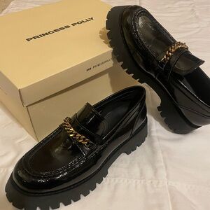 Princess Polly Black Patent Loafers with Gold Chain